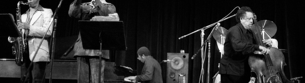 Charles Mingus, Ricky Ford, Jack Walrath, Bob Neloms, and Charles Mingus- Photo by Uberto Sagramoso.